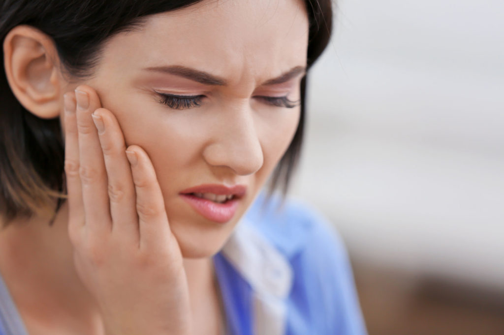 Woman with jaw pain [city], [state]